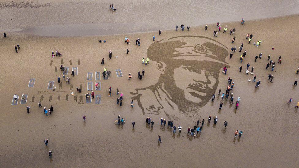 Walter Tull's image on Ayr sands