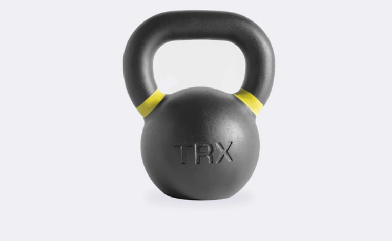 black 35 lb kettle bell with yellow tape and company name TRX on it.
