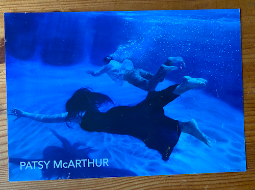 Cover for work featuring figures underwater by Patsy McArthur
