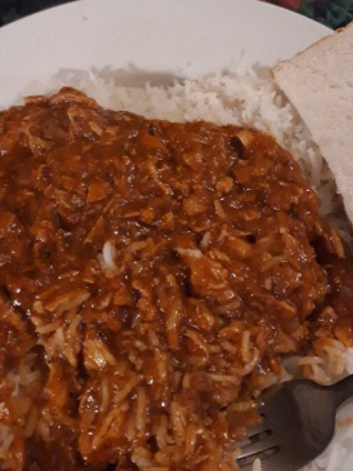 A plate of piping hot curry containing Quorn, butternut squash