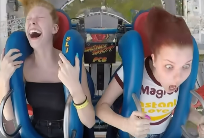 Two girls on Slingshot ride, on horrified