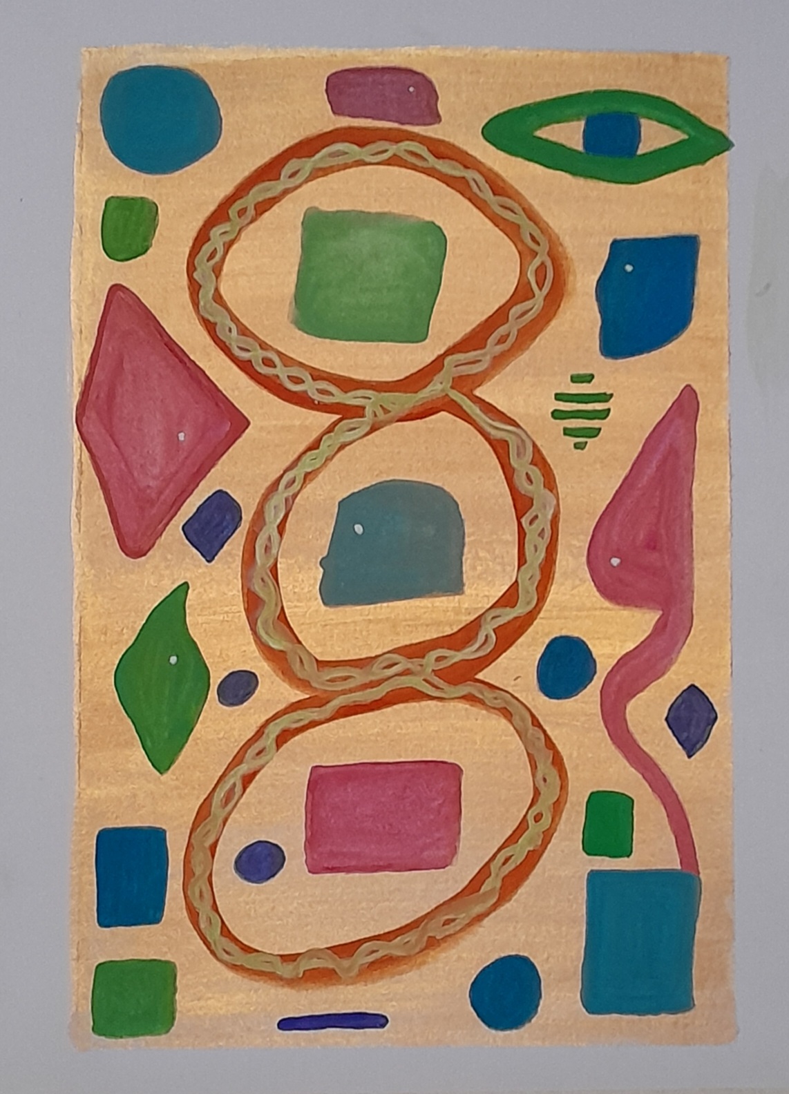 Different coloured objects of various shapes on a gold background around a triple helix, there's a large rye in top right corner.