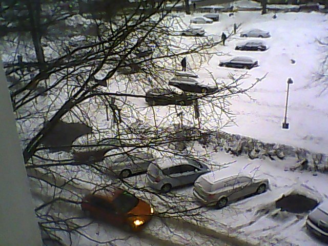 A car driven through a snow covered street in Helsinki, Finland.