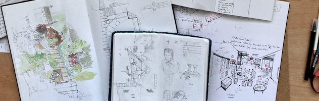 A photograph of lots of different sketchbooks showing many different drawing types and styles - from scribbles to paintings.